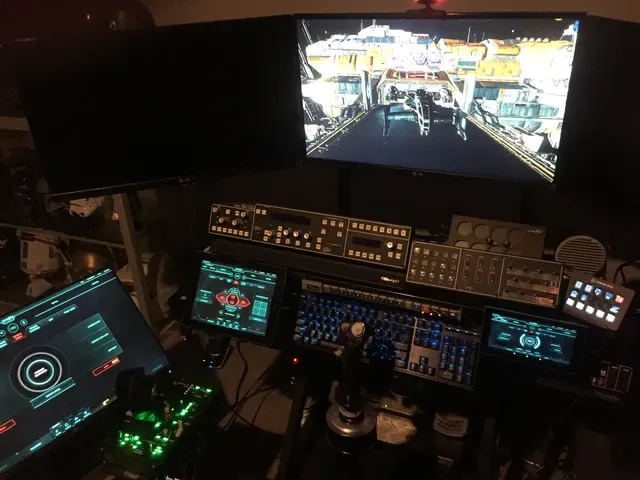 A player's desk setup running GameGlass panels on a tablet