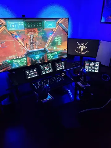 A player's desk setup running GameGlass panels on a tablet