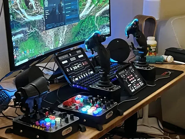 A player's desk setup running GameGlass panels on a tablet
