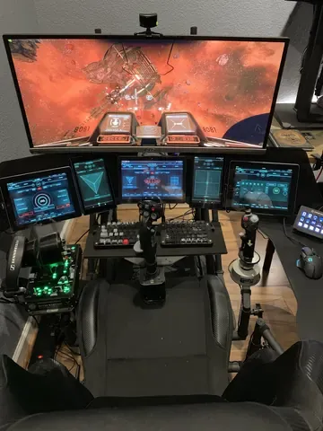 A player's desk setup running GameGlass panels on a tablet