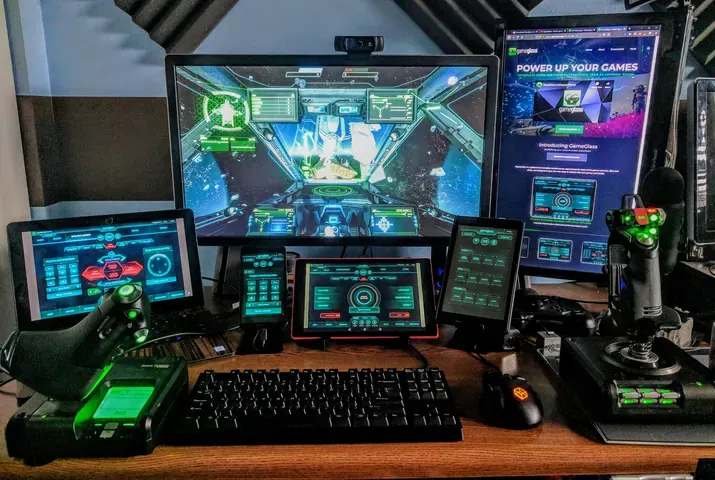 A player's desk setup running GameGlass panels on a tablet