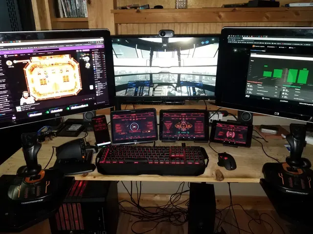 A player's desk setup running GameGlass panels on a tablet