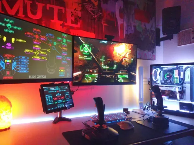 A player's desk setup running GameGlass panels on a tablet